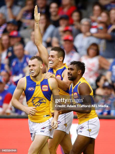 Daniel Venables of the Eagles celebrates his first AFL goal with with teammates Jake Waterman and Liam Ryan of the Eagles during the 2018 AFL round...