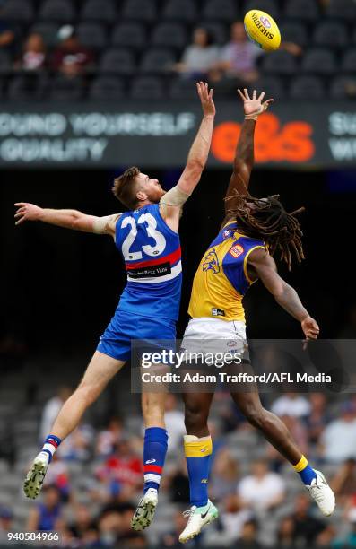 Nic Naitanui of the Eagles and Jordan Roughead of the Bulldogs compete in a ruck contest during the 2018 AFL round 02 match between the Western...