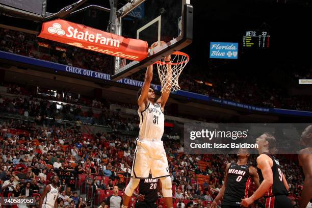 Jarrett Allen of the Brooklyn Nets dunks the ball against the Miami Heat on March 31st, 2018 at American Airlines Arena in Miami, Florida. NOTE TO...