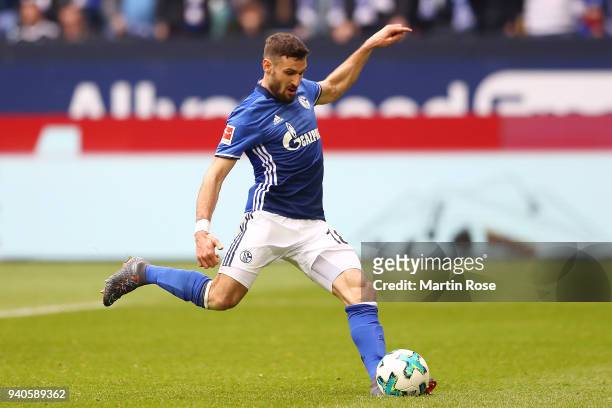 Daniel Caligiuri of Schalke scores a penalty goal to make it 1:0 during the Bundesliga match between FC Schalke 04 and Sport-Club Freiburg at...
