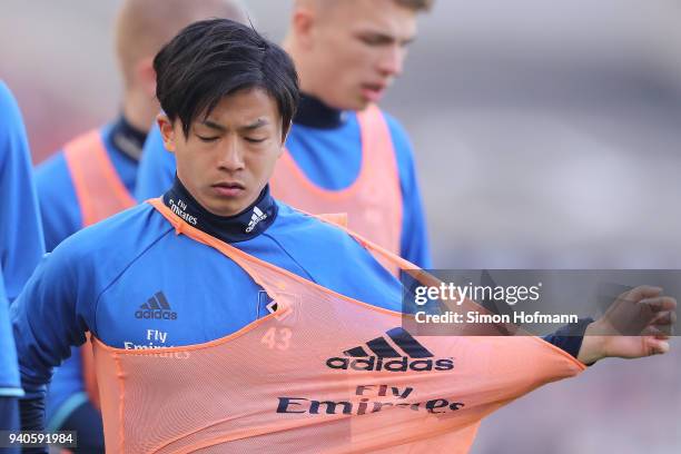 Tatsuya Ito of Hamburg warms up during the Bundesliga match between VfB Stuttgart and Hamburger SV at Mercedes-Benz Arena on March 31, 2018 in...