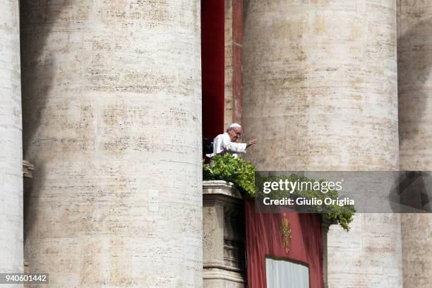 Pope Francis delivers his traditional 'Urbi et Orbi' Blessing to the City of Rome and to the World from the central balcony overlooking St. Peter's...