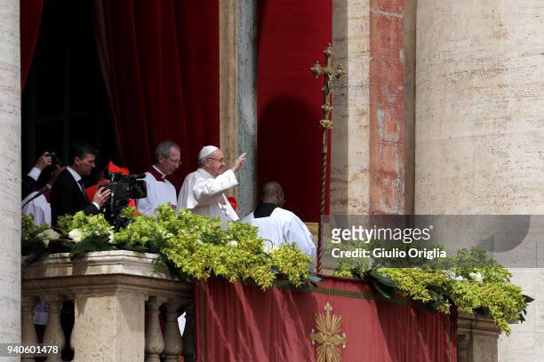Pope Francis delivers his traditional 'Urbi et Orbi' Blessing to the City of Rome and to the World from the central balcony overlooking St. Peter's...