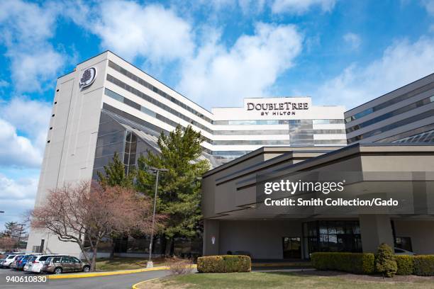 Exterior view of facade of the Doubletree Newark Airport hotel by Hilton Hotels in Newark, New Jersey on a sunny day, March 16, 2018.