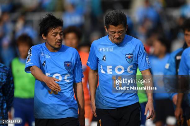 Kazuyoshi Miura and Daisuke Matsui of Yokohama FC look on after the J.League J2 match between Yokohama FC and Zweigen Kanazawa at Nippatsu Mitsuzawa...