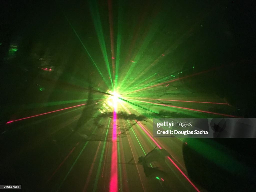 Laser light show in a dark room