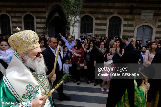 Greek Orthodox Patriarch of Antioch and All East John X Yazigi walks outside the Mariamite Cathedral of Damascus, one of the oldest Greek Orthodox...