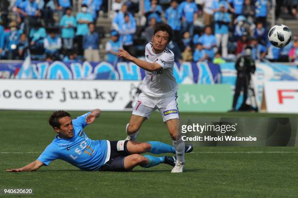 Eijiro Takeda of Yokohama FC and Shohei Kiyohara of Zweigen Kanazawa compete for the ball during the J.League J2 match between Yokohama FC and...