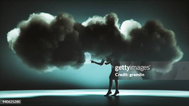 cloud computing businesswoman conceptual image - control freak stock pictures, royalty-free photos & images