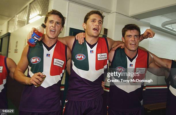 Trent Croad#24, Justin Longmuir and Leigh Brown for the Fremantle Dockers celebrate after winning round two of the AFL Season. Fremantle Dockers v St...