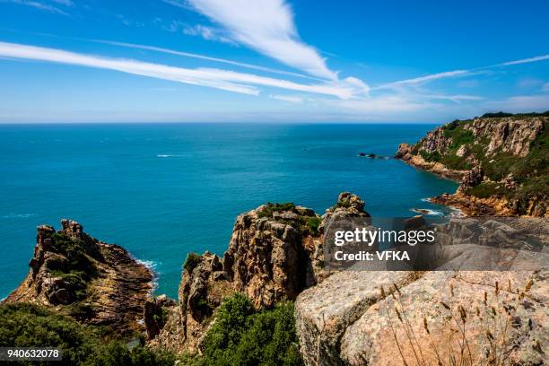 cliffs at fiquet bay, southwestern coast of jersey, channel islands - jersey england stock pictures, royalty-free photos & images