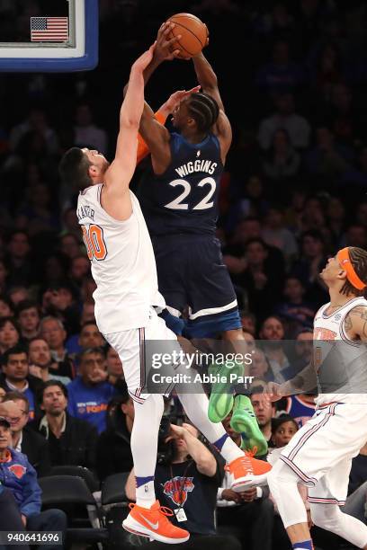 Andrew Wiggins of the Minnesota Timberwolves takes a shot against Enes Kanter of the New York Knicks in the fourth quarter during their game at...