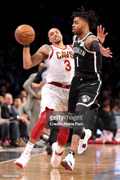 George Hill of the Cleveland Cavaliers collides with D'Angelo Russell of the Brooklyn Nets in the third quarter during their game at Barclays Center...