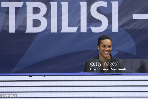 France head coach smiles as Audrey Tcheumeo wins her -78 kg Gold medal during Tbilisi Grand Prix at New Sports Palace on April 1, 2018 in Tbilisi,...