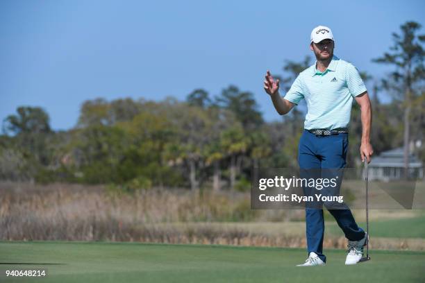 Sam Burns acknowledges the crowd on the 18th green during the third round of the Web.com Tour's Savannah Golf Championship at the Landings Club Deer...