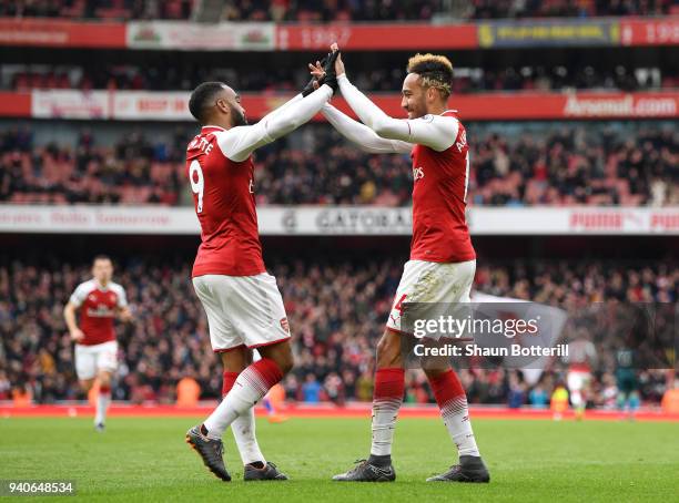 Pierre-Emerick Aubameyang of Arsenal celebrates after scoring his sides second goal with Alexandre Lacazette of Arsenal during the Premier League...