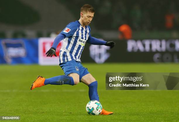 Mitchell Weiser of Berlin runs with the ball during the Bundesliga match between Hertha BSC and VFL Wolfsburg at Olympiastadion on March 31, 2018 in...