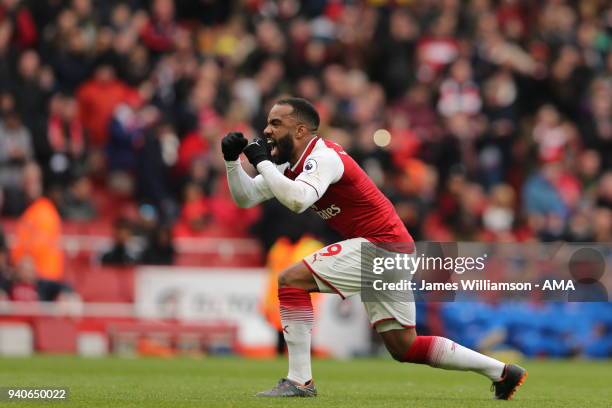 Alexandre Lacazette of Arsenal celebrates after scoring a goal to make it 3-0 during the Premier League match between Arsenal and Stoke City at...