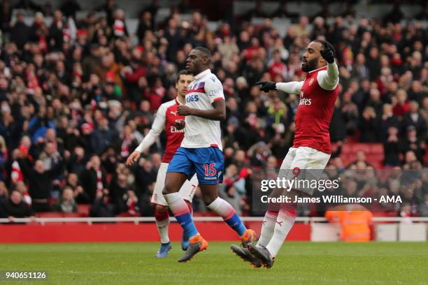 Alexandre Lacazette of Arsenal scores a goal to make it 3-0 during the Premier League match between Arsenal and Stoke City at Emirates Stadium on...