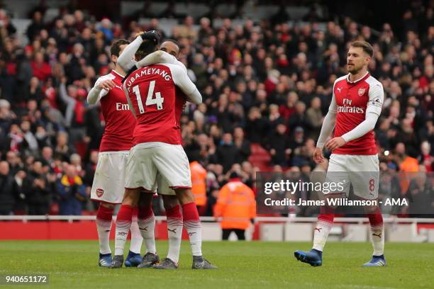Alexandre Lacazette of Arsenal scores a goal to make it 3-0 during the Premier League match between Arsenal and Stoke City at Emirates Stadium on...
