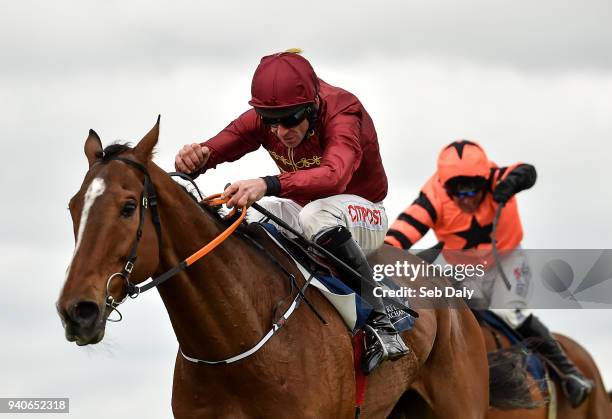 Meath , Ireland - 1 April 2018; Pallasator, left, with Davy Russell up, leads Jets, behind, with Robbie Power up, on their way to winning the...