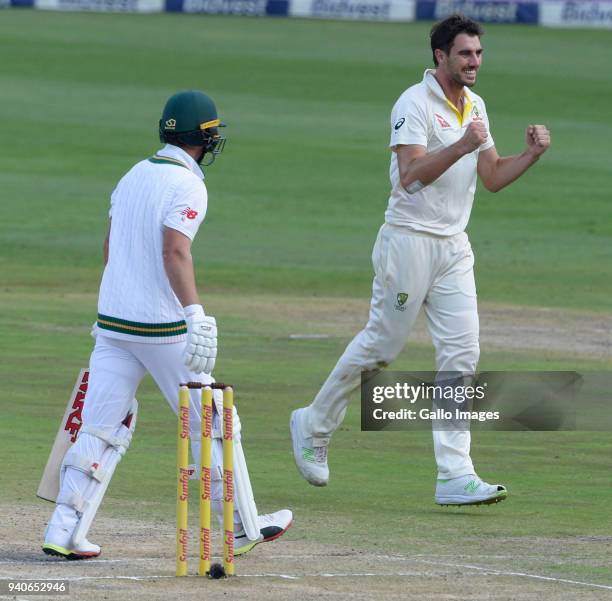 Pat Cummins of Australia celebrates the wicket of AB de Villiers of the Proteas during day 3 of the 4th Sunfoil Test match between South Africa and...