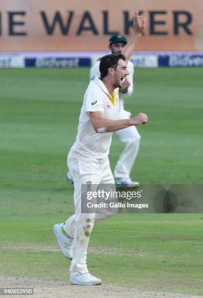 Pat Cummins of Australia celebrates the wicket of AB de Villiers of the Proteas during day 3 of the 4th Sunfoil Test match between South Africa and...