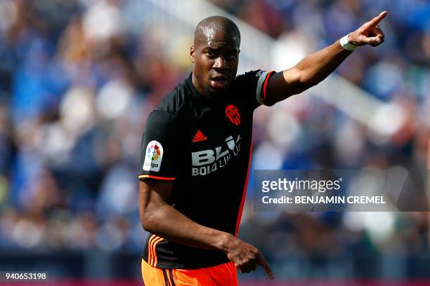 Valencia's French midfielder Geoffrey Kondogbia reacts during the Spanish League football match between Leganes and Valencia at the Butarque stadium...