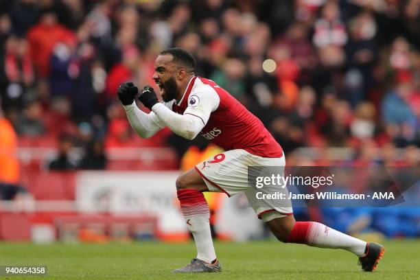 Alexandre Lacazette of Arsenal celebrates after scoring a goal to make it 3-0 during the Premier League match between Arsenal and Stoke City at...