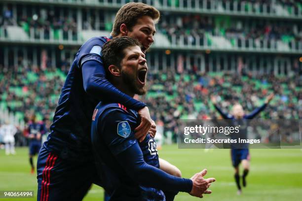 Carel Eiting of Ajax, celebrate the 1-2 with Klaas Jan Huntelaar of Ajax after his goal during the Dutch Eredivisie match between FC Groningen v Ajax...