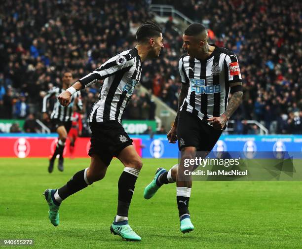 Ayoze Perze of Newcastle United celebrates with team mate Kennedy after scoring the only goal of the game during the Premier League match between...