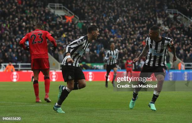 Ayoze Perze of Newcastle United celebrates with team mate Kennedy after scoring the only goal of the game during the Premier League match between...