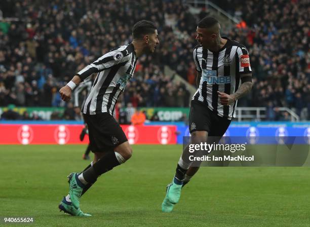 Ayoze Perze of Newcastle United celebrates with team mate Kennedy after scoring the only goal of the game during the Premier League match between...