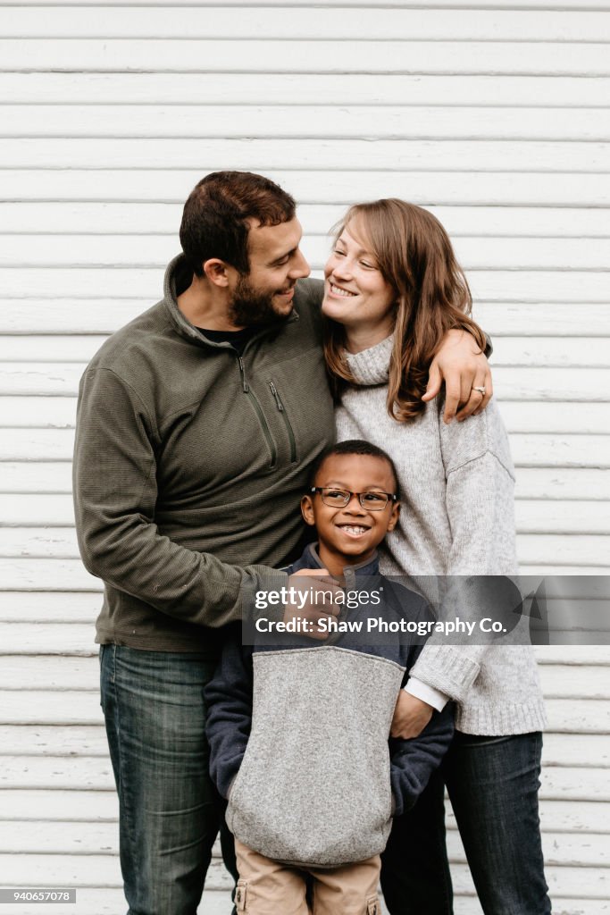 Multi racial family photos with adoptive son