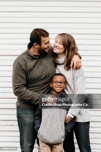 Multi racial family photos with adoptive son