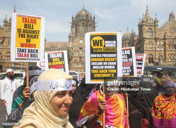 Thousands of Muslim women staged a silent protest march demanding withdrawal of the Bill banning triple talaq passed by Lok Sabha last December, at...