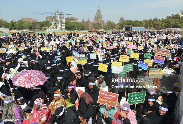 Thousands of Muslim women staged a silent protest march demanding withdrawal of the Bill banning triple talaq passed by Lok Sabha last December, at...