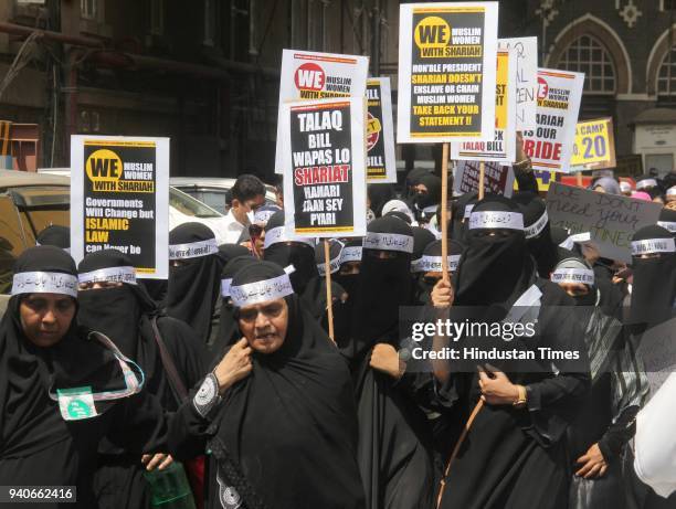 Thousands of Muslim women staged a silent protest march demanding withdrawal of the Bill banning triple talaq passed by Lok Sabha last December, at...