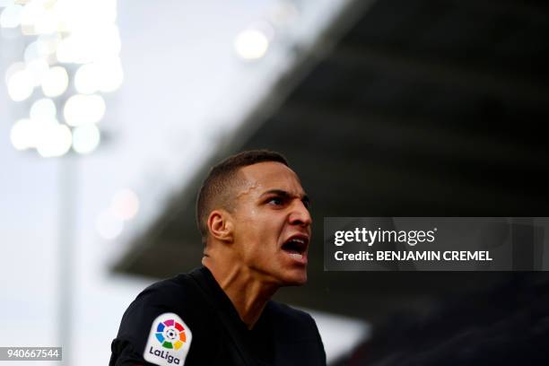 Valencia's Brazilian-Spanish forward Rodrigo Moreno celebrates after scoring a goal during the Spanish League football match between Leganes and...