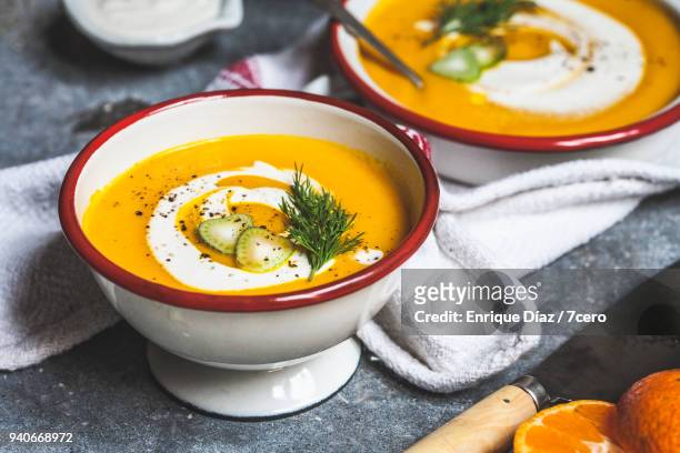 carrot, fennel and mandarin soup for two - soup stock pictures, royalty-free photos & images