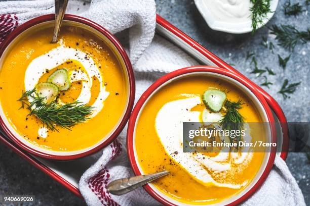 carrot, fennel and mandarin soups in tray - winter food imagens e fotografias de stock