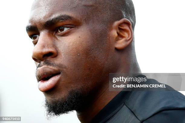 Valencia's French midfielder Geoffrey Kondogbia reacts during the Spanish League football match between Leganes and Valencia at the Butarque stadium...