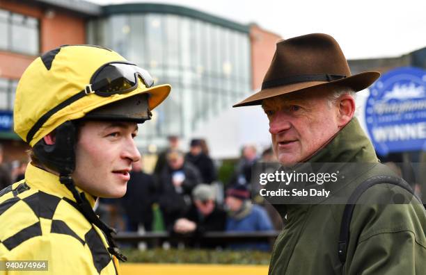 Meath , Ireland - 1 April 2018; Trainer Willie Mullins, right, with jockey David Mullins after winning the Ryanair Gold Cup Novice Steeplechase with...