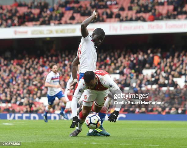 Alex Lacazette is tripped for the 2nd Arsenal penalty by Stoke defender Badou Ndiaye during the Premier League match between Arsenal and Stoke City...