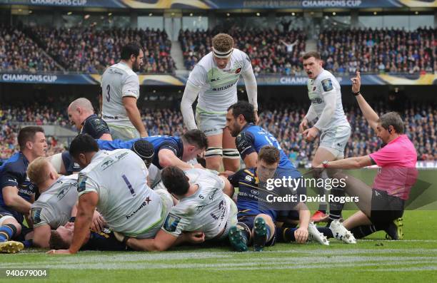 Jerome Garces, the referee awards a try to Blair Cowan of Saracens during the European Rugby Champions Cup quarter final match between Leinster Rugby...