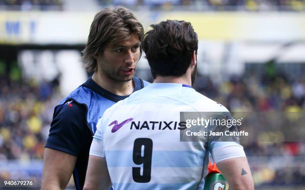 Water boy Dimitri Szarzewski of Racing 92 talks to Maxime Machenaud of Racing 92 during the European Rugby Champions Cup match between ASM Clermont...
