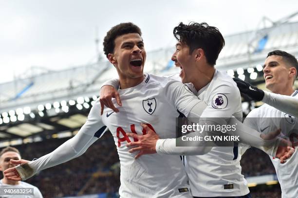 Tottenham Hotspur's English midfielder Dele Alli celebrates with Tottenham Hotspur's South Korean striker Son Heung-Min after scoring their second...