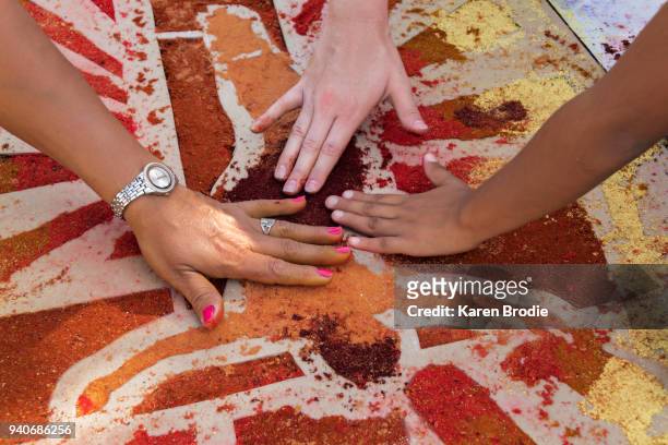 making alfombras (sawdust carpets) - good friday stock pictures, royalty-free photos & images