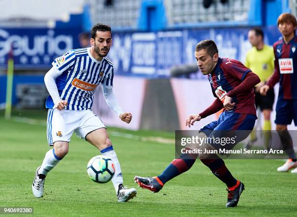 Juan Miguel Jimenez 'Juanmi' of Real Sociedad duels for the ball with Ruben Pena of SD Eibar during the La Liga match between SD Eibar and Real...