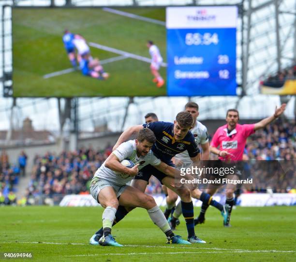 Dublin , Ireland - 1 April 2018; Richard Wigglesworth of Saracens is tackled by Garry Ringrose of Leinster during the European Rugby Champions Cup...